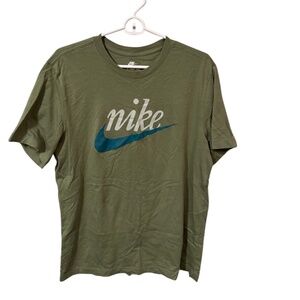 Emerald green Nike cotton Tee with blue swoosh design, cursive white logo, sizeM